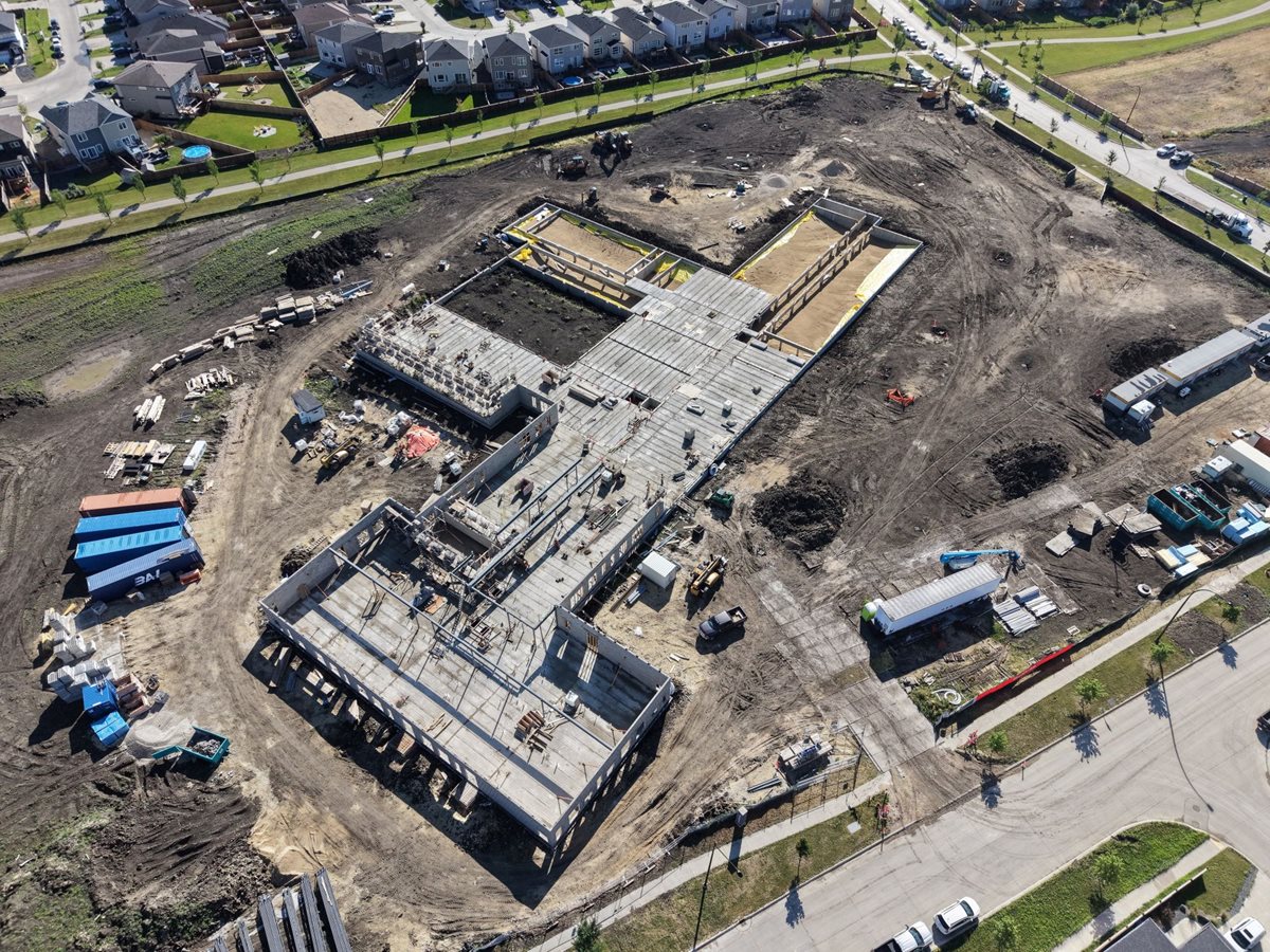 École Iskonakwa School construction site. Foundation is set and brick walls are starting to go up. 